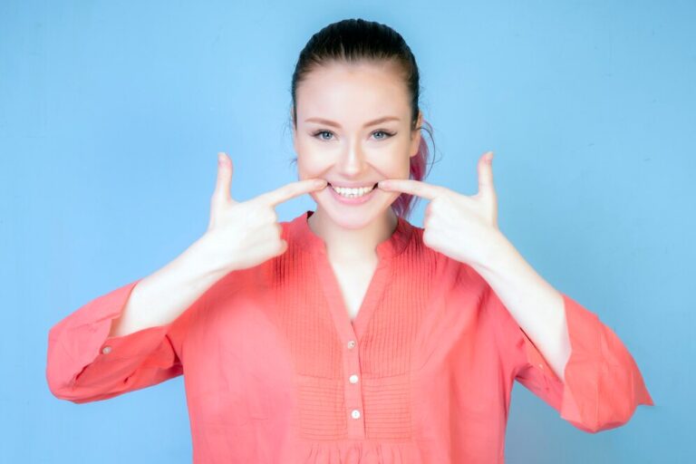 smiling girl with coral color blouse 141793 263