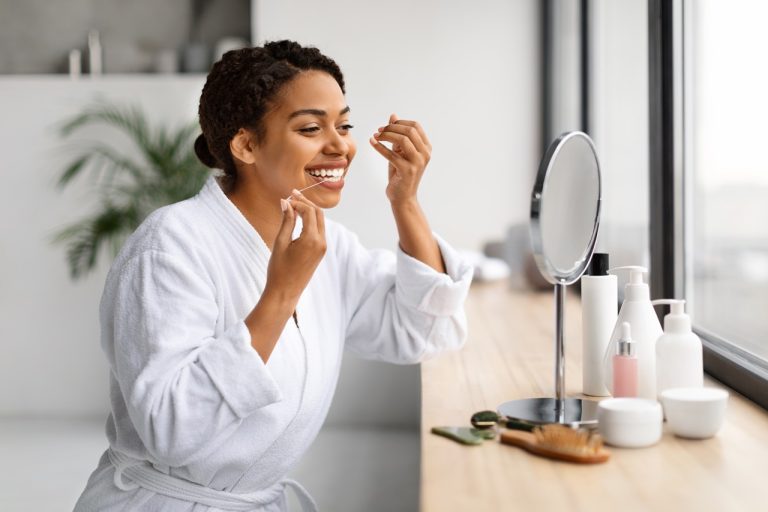 woman flossing